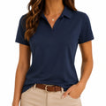 Polo femme taille S en tissu bleu marine à manches courtes style décontracté