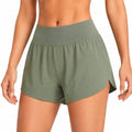 Short femme taille M vert kaki en tissu léger taille haute style sportif